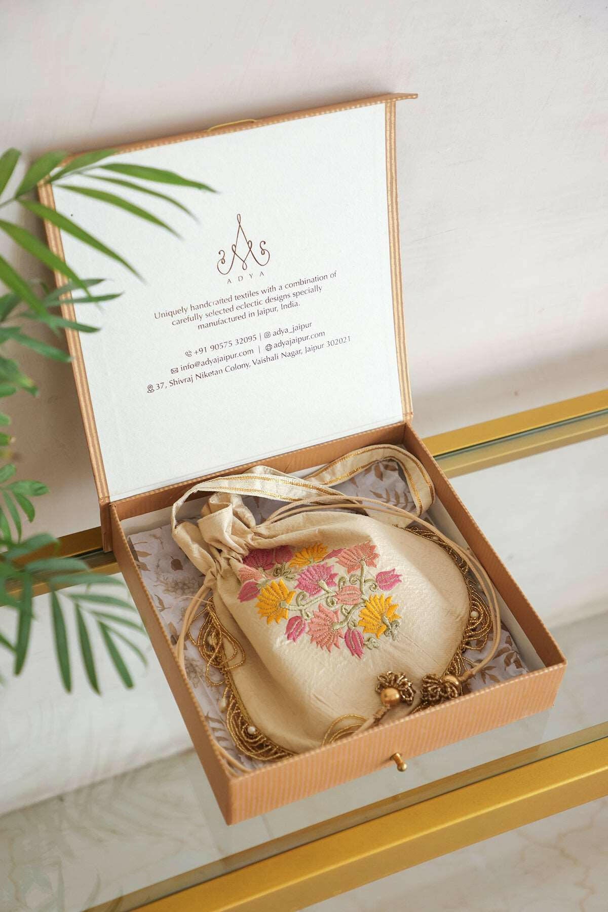 Ivory Embroidered Raw Silk Potli Bag