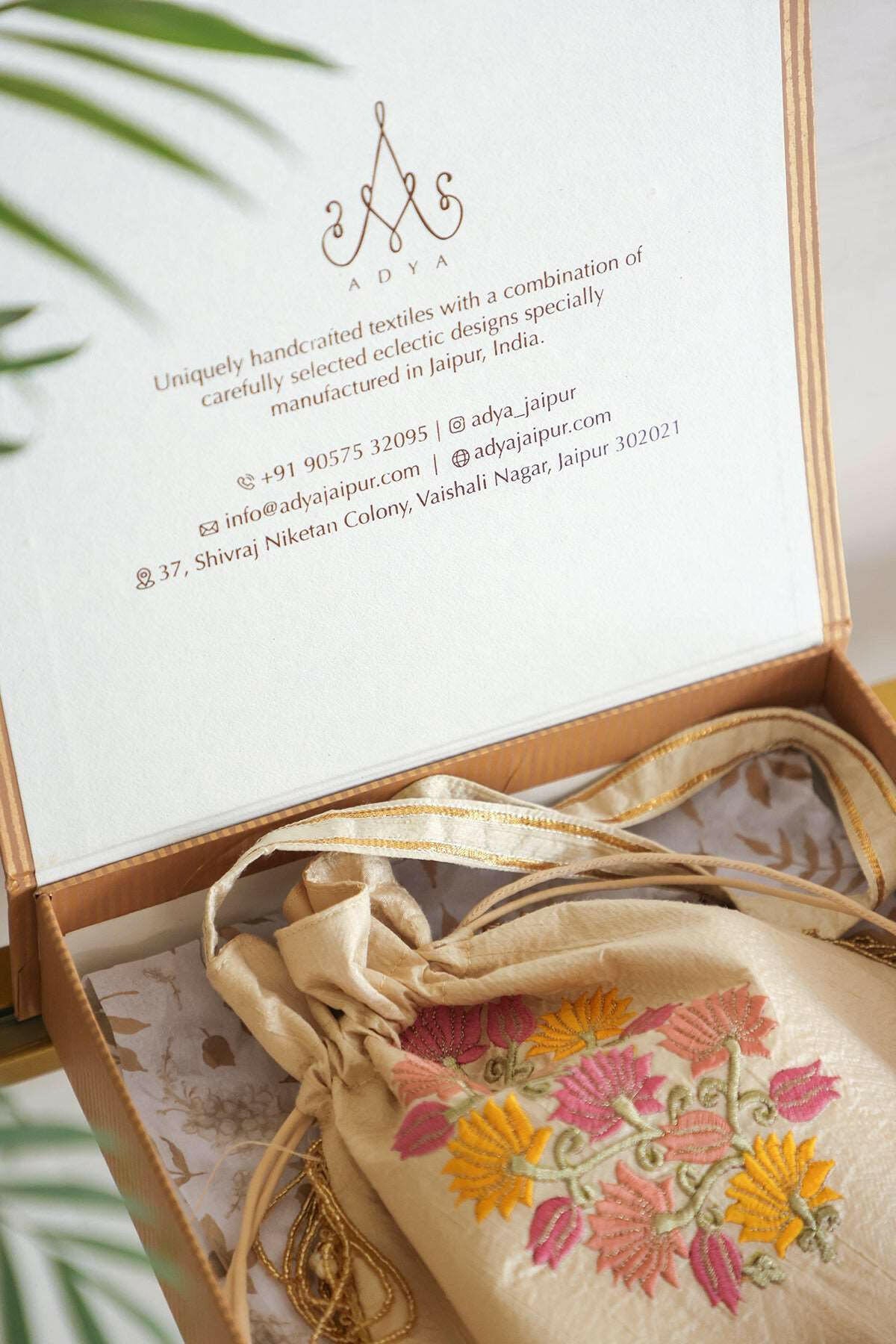 Ivory Embroidered Raw Silk Potli Bag