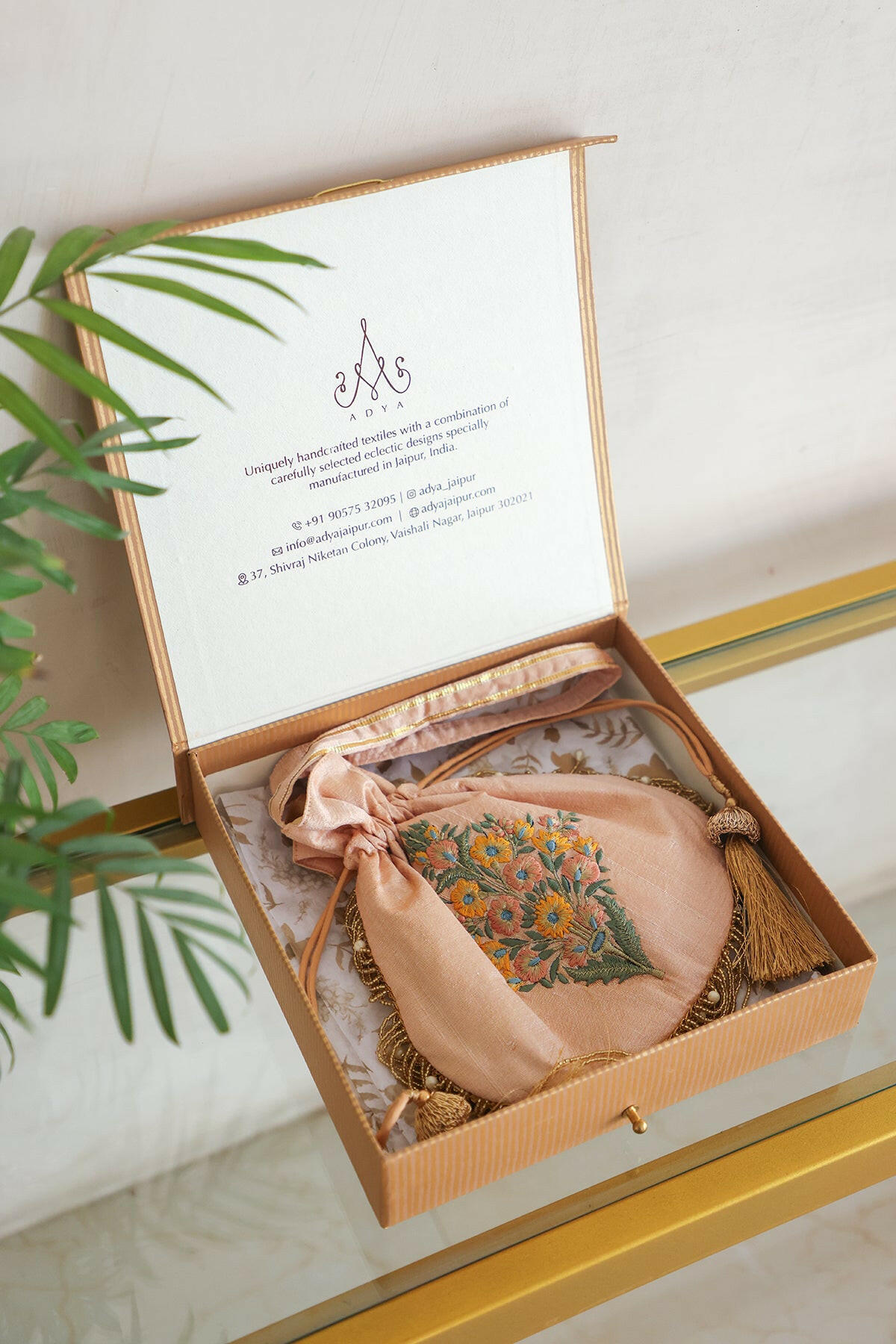 Off White Embroidered Raw Silk Potli Bag