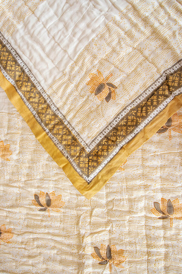 Serene Saffron Lotus Cotton Quilt