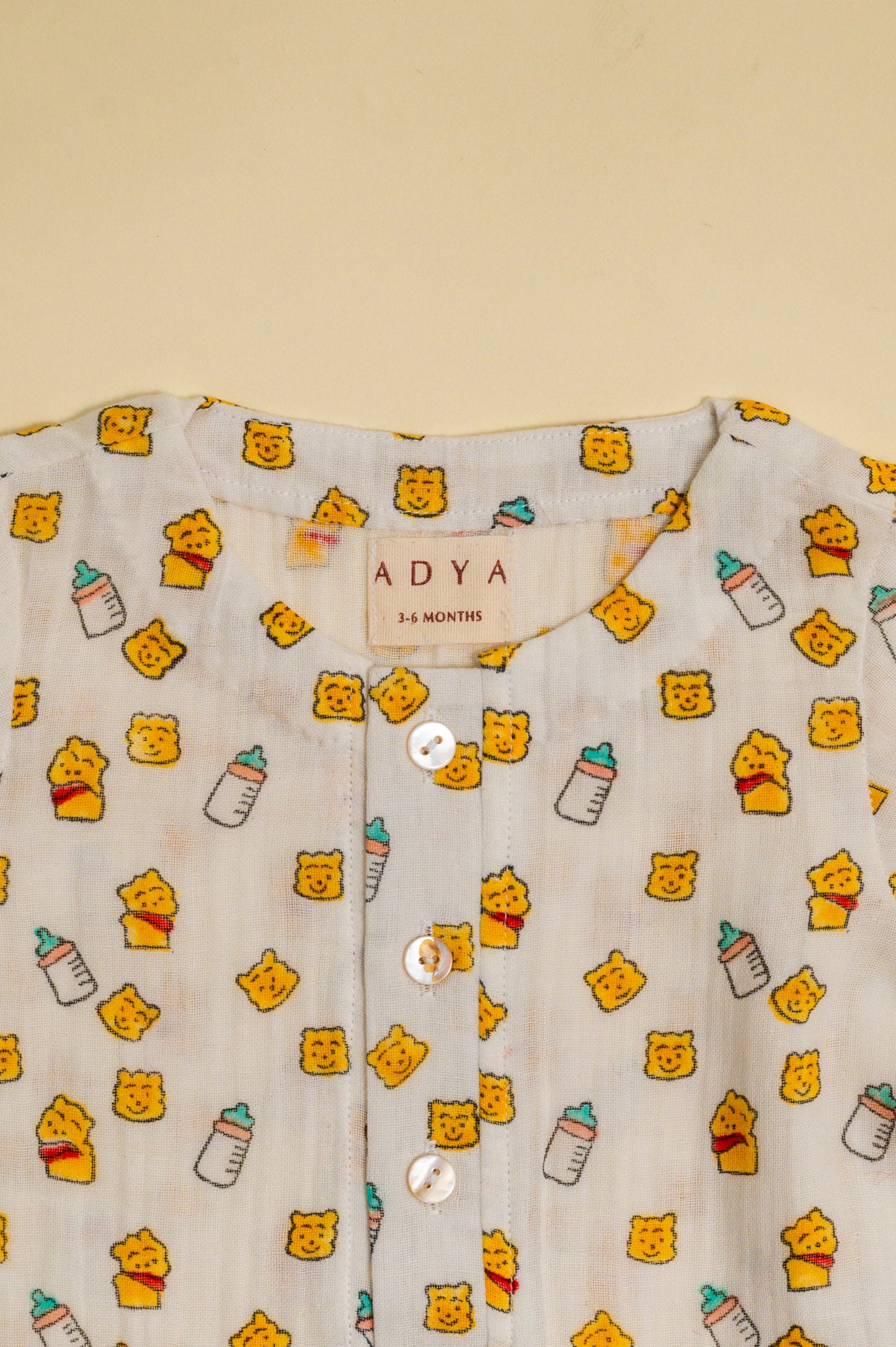 Yellow Pooh Infant Romper